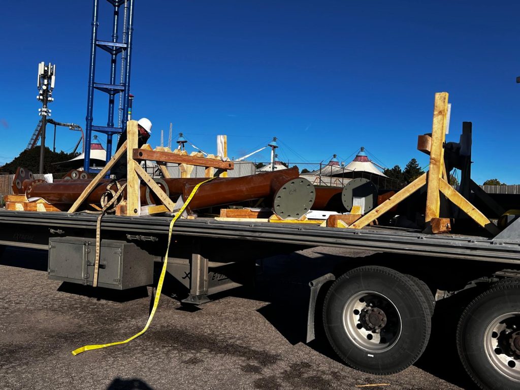 Fabricated steel components secured on flatbed trailer